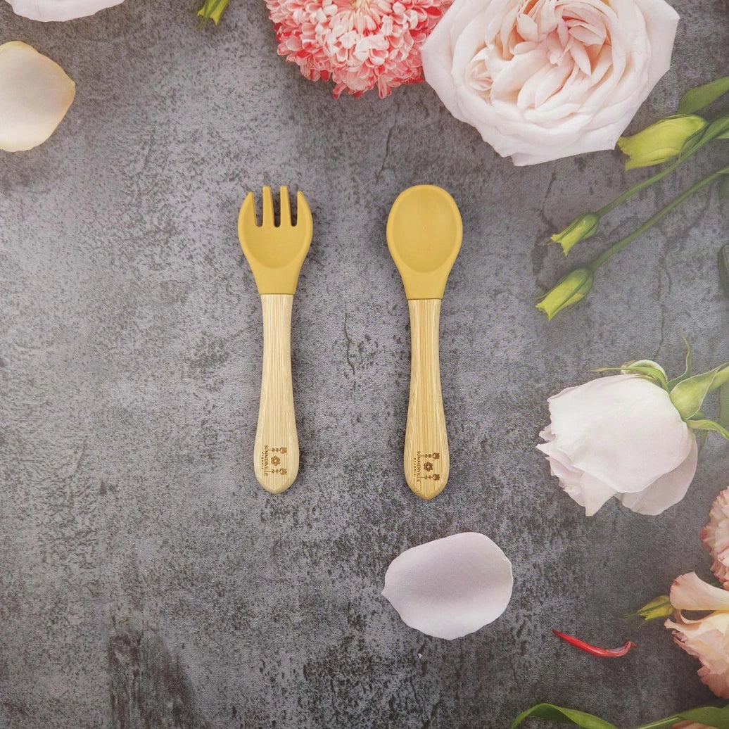 Baby spoon and fork made from natural bamboo and food grade silicone for everyday meals