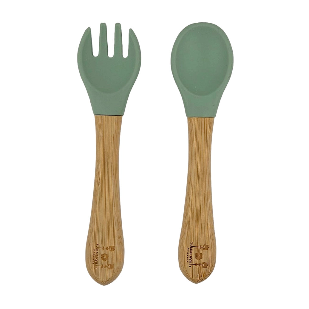 Eco friendly bamboo spoon and fork set with green silicone tips for toddler mealtimes