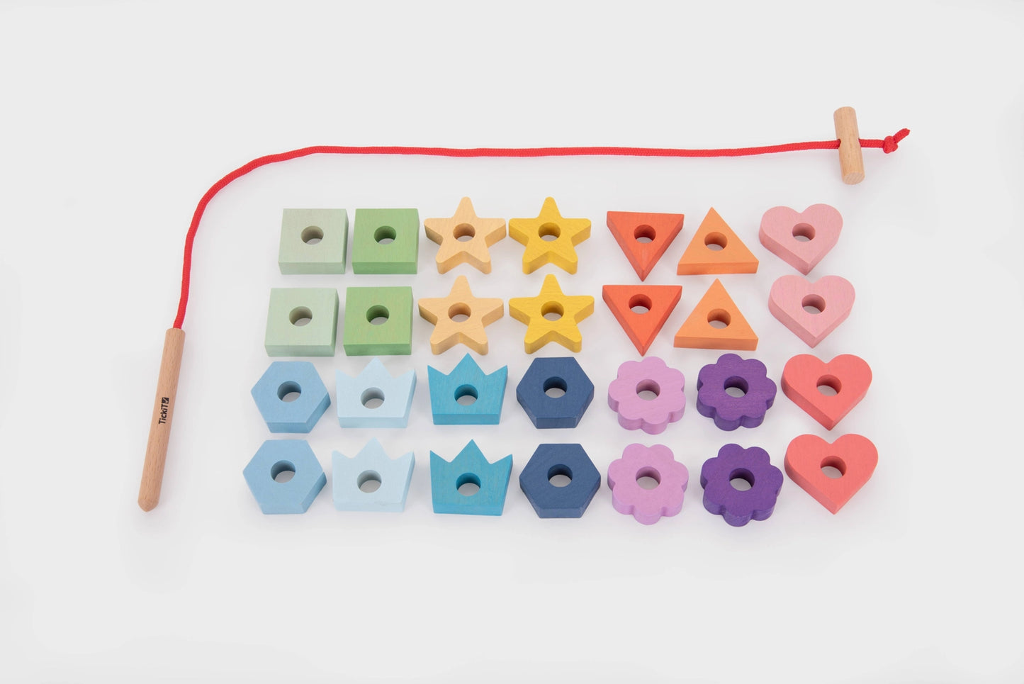 Montessori inspired rainbow wooden lacing activity for fine motor development and early learning