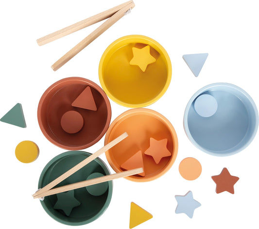Montessori inspired sorting activity with tongs for sensory learning and motor skill development