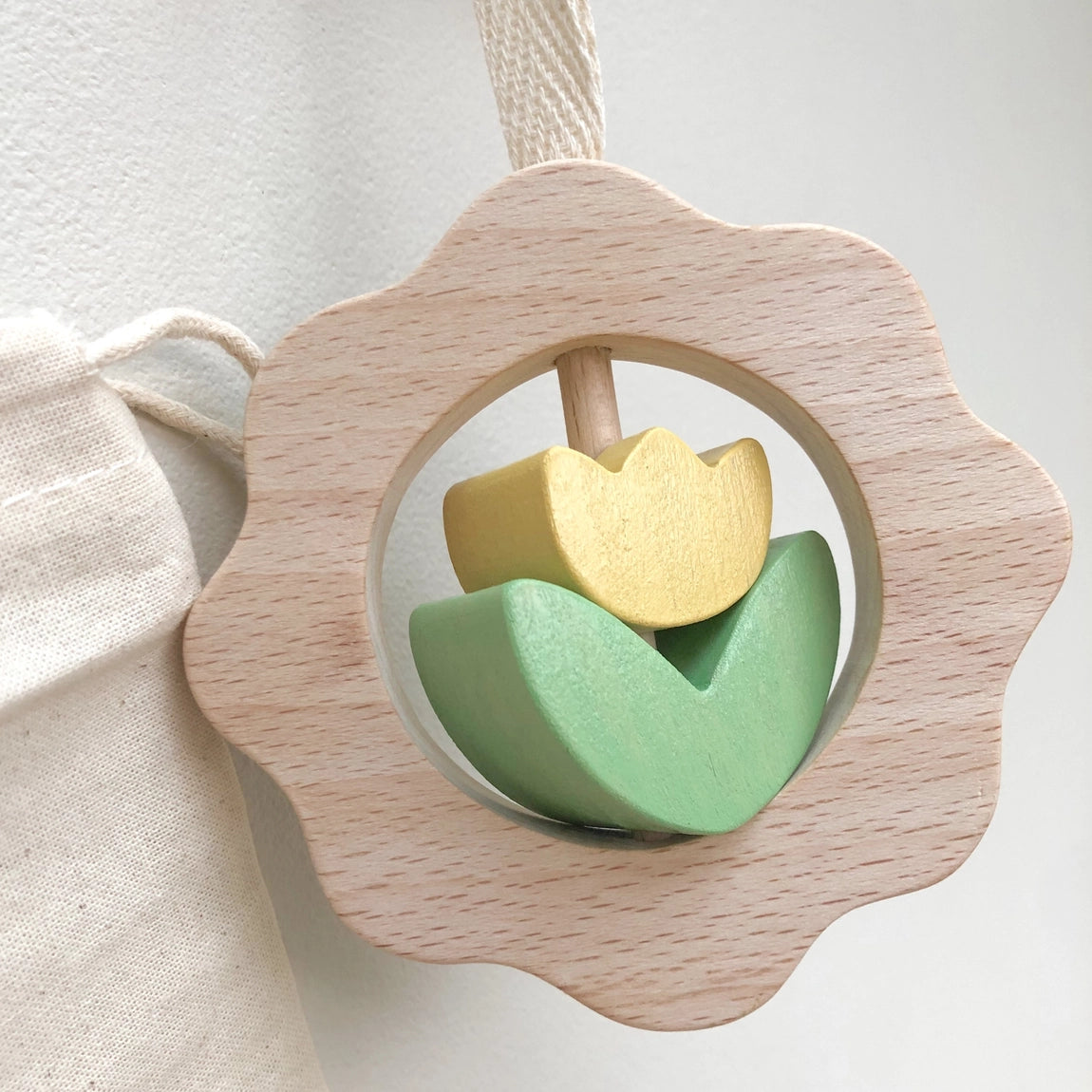Montessori wooden baby rattle with tulip design