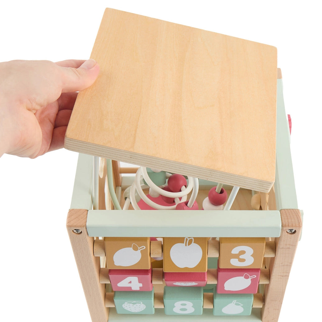 Wooden activity cube for toddlers