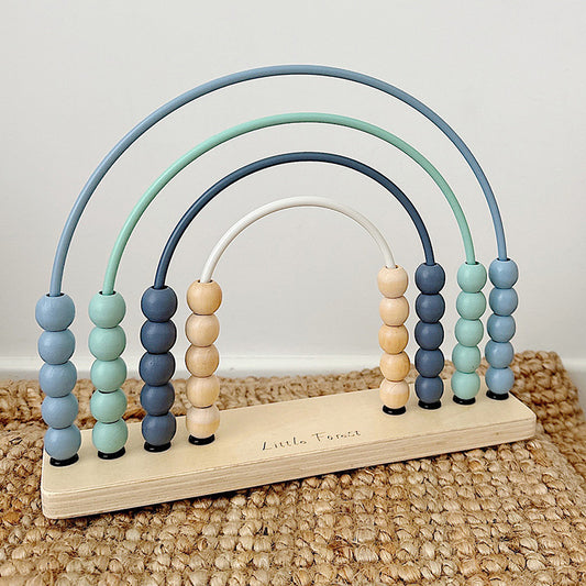 Wooden math toy with blue counting beads