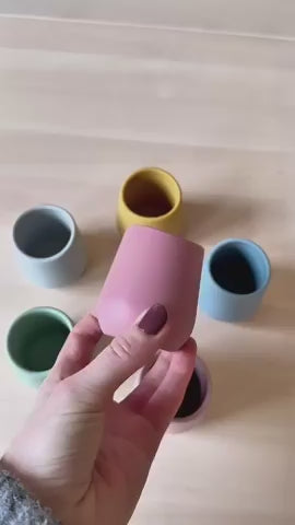 Silicone baby mini cup 60 ml in cameo green for toddlers transitioning from bottle to cup
